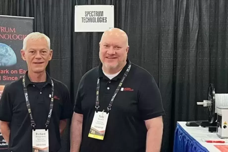 Two people standing and looking at camera