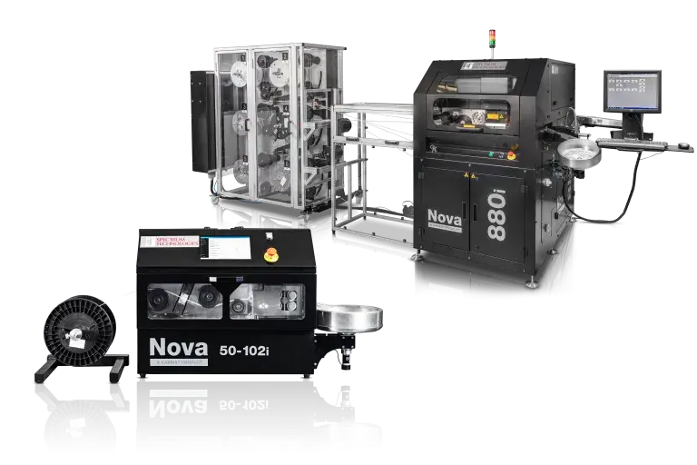 Two black machine one is silver for wire processing